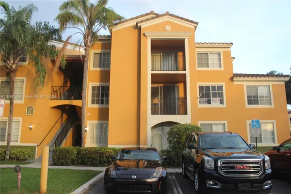 a front view of a house with outdoor space