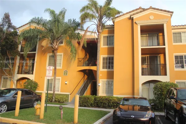 a front view of a house with outdoor space