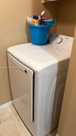 a kitchen with a stove and a microwave