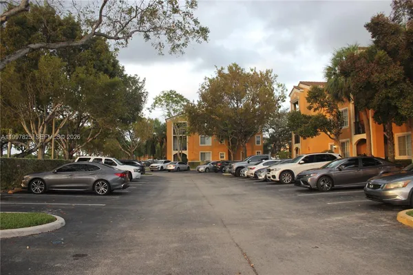 a view of street with parked cars