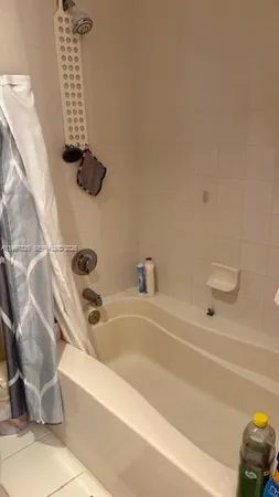 a bathroom with a bathtub