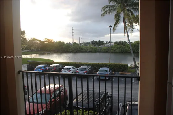a view of a lake from a balcony