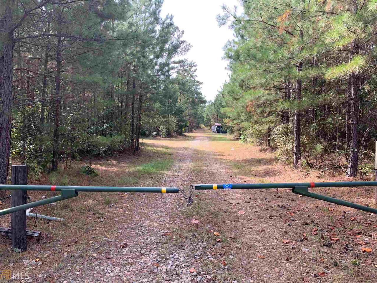 0 Jones Woods Road Good Hope, GA 30641 - Photo 1 of 1 a view of dirt yard with a barn