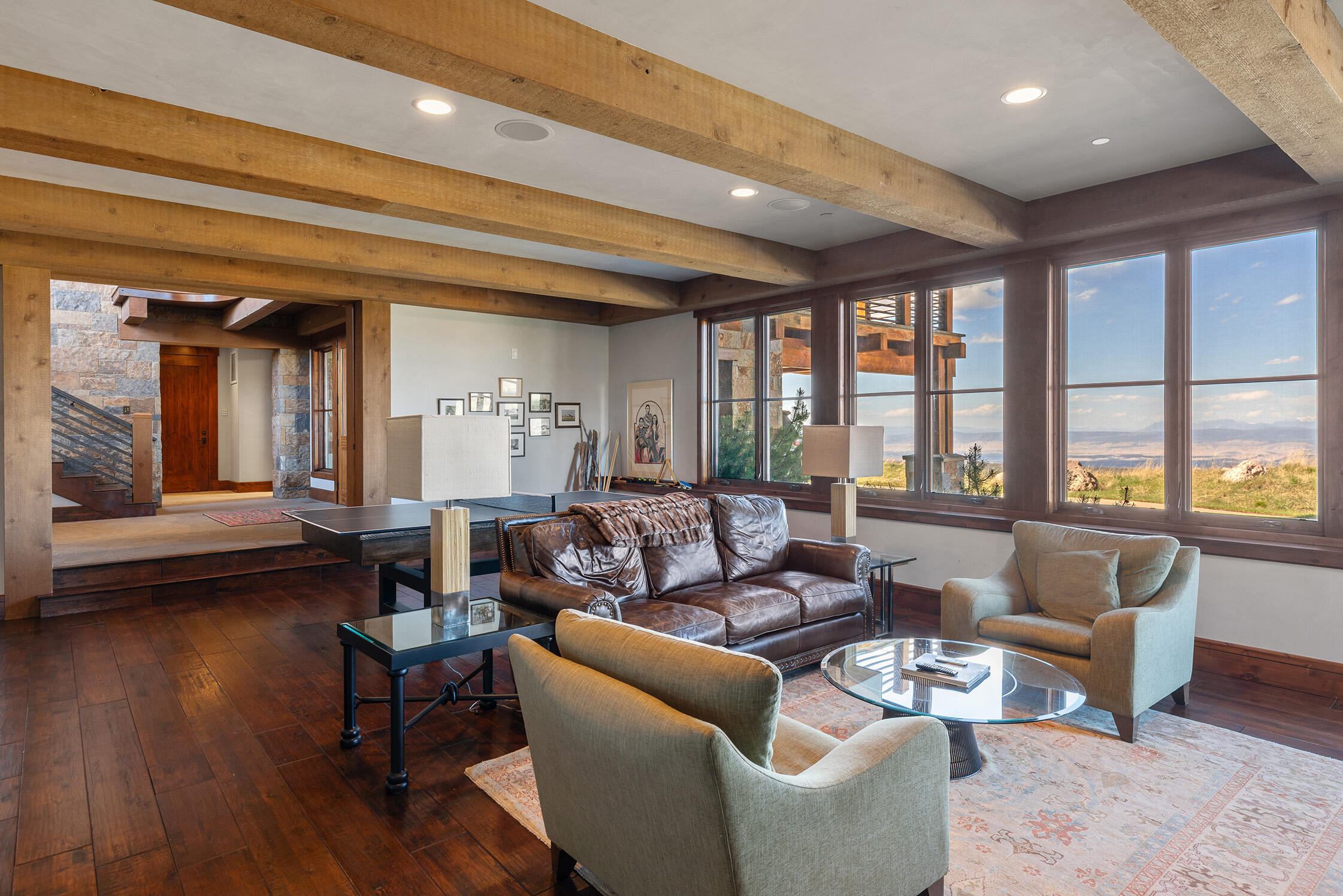 1221 Cornerstone Loop Montrose, CO 81403 - Photo 29 of 44 a living room with furniture and a large window