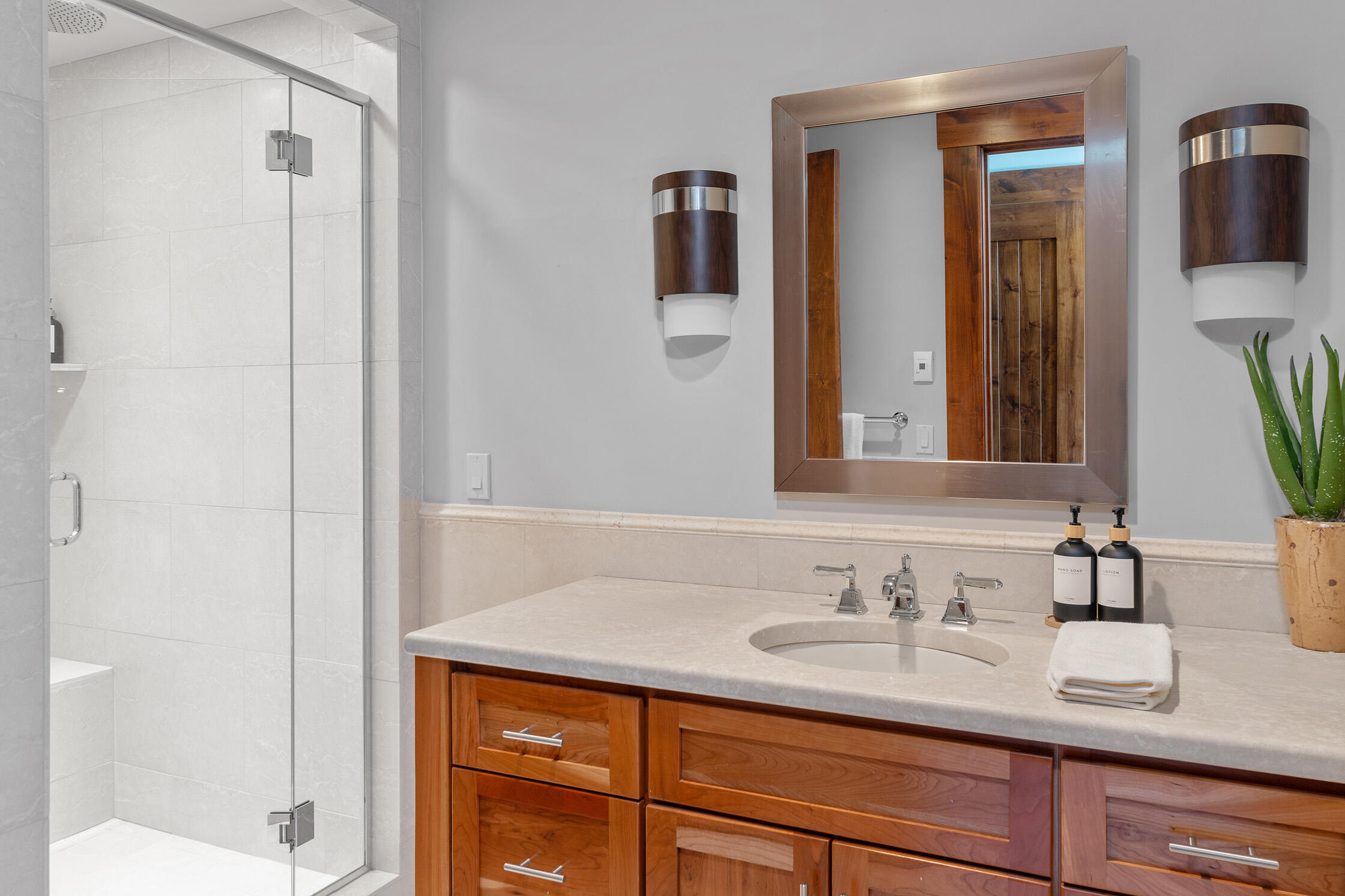 1221 Cornerstone Loop Montrose, CO 81403 - Photo 38 of 44 a bathroom with a sink and a mirror