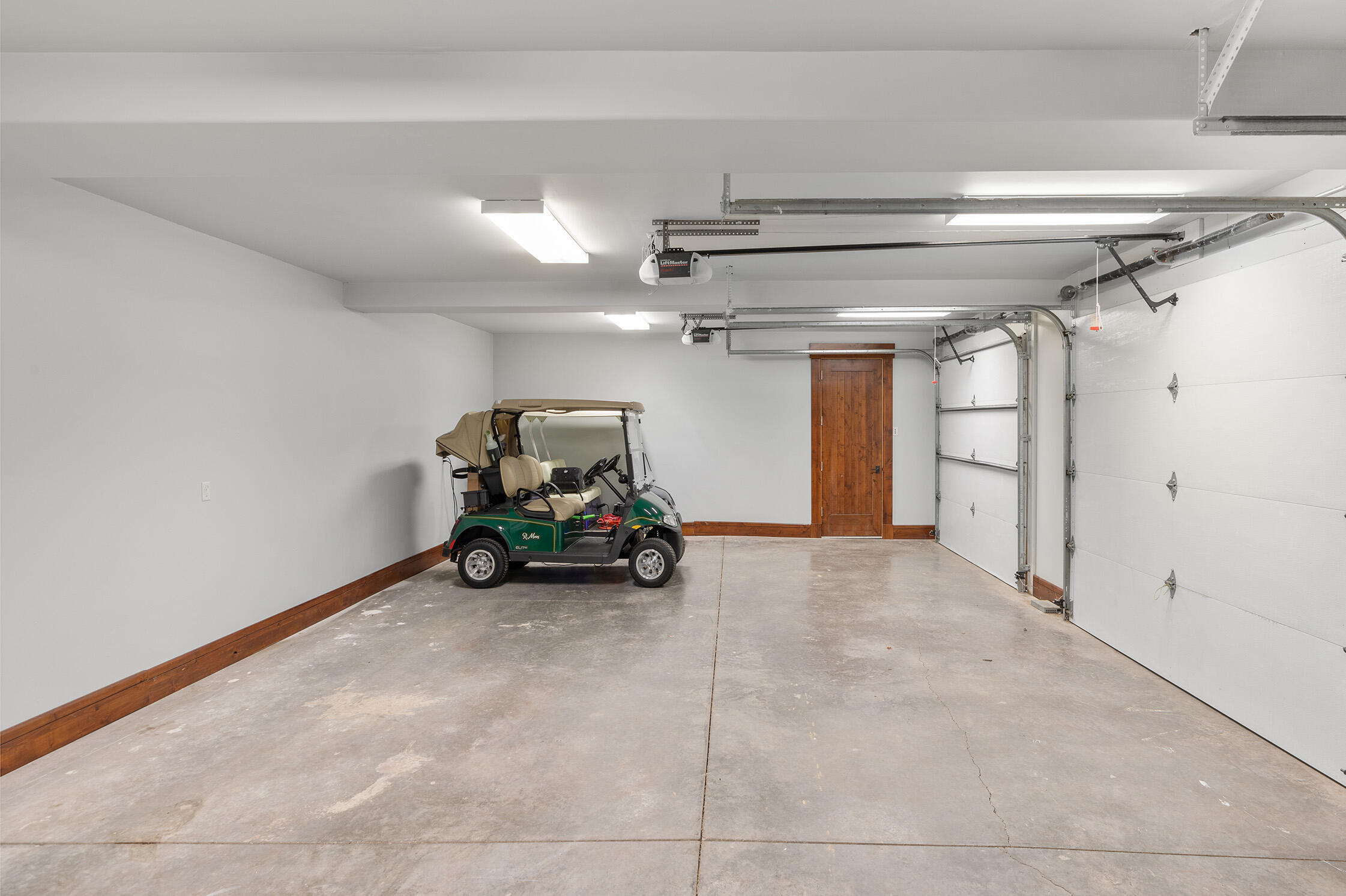 1221 Cornerstone Loop Montrose, CO 81403 - Photo 42 of 44 a view of a garage with furniture and a garage