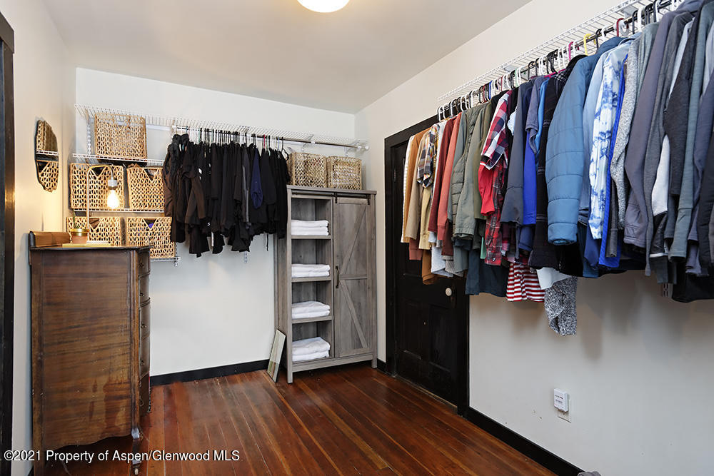 113 West State Street Marble, CO 81623 - Photo 15 of 28 a view of walk in closet with clothes and shoes