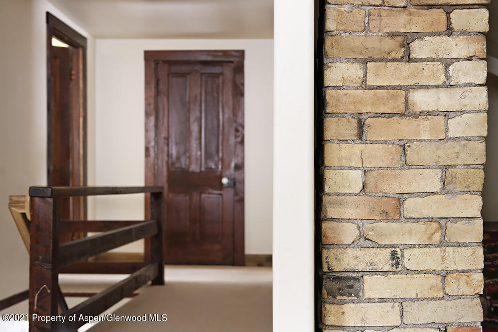 113 West State Street Marble, CO 81623 - Photo 19 of 28 a view of a bathroom with a sink and a window