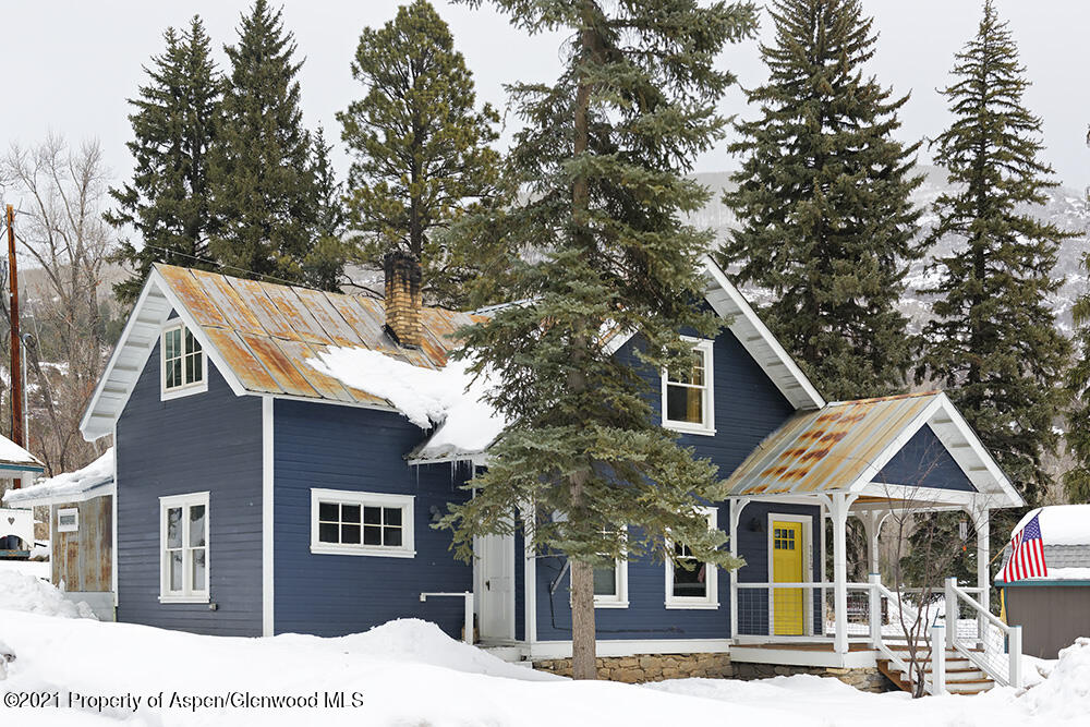 113 West State Street Marble, CO 81623 - Photo 27 of 28 a front view of a house with a yard