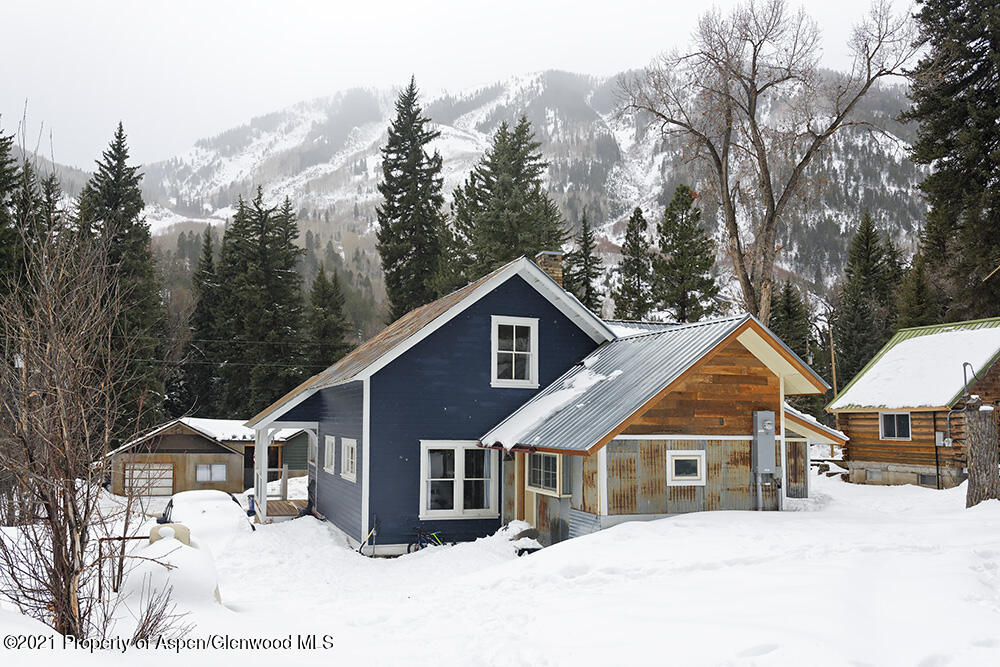 113 West State Street Marble, CO 81623 - Photo 28 of 28 a view of a house with a yard covered in snow