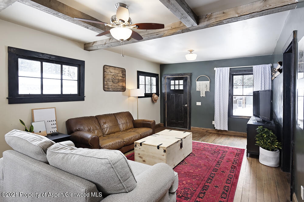 113 West State Street Marble, CO 81623 - Photo 8 of 28 a living room with furniture and wooden floor
