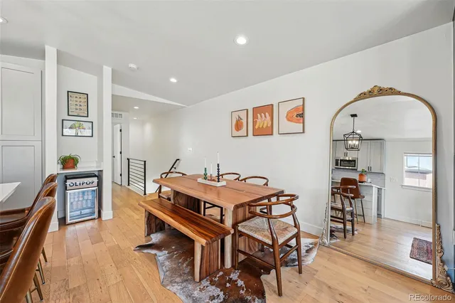 a view of a livingroom with furniture and wooden floor