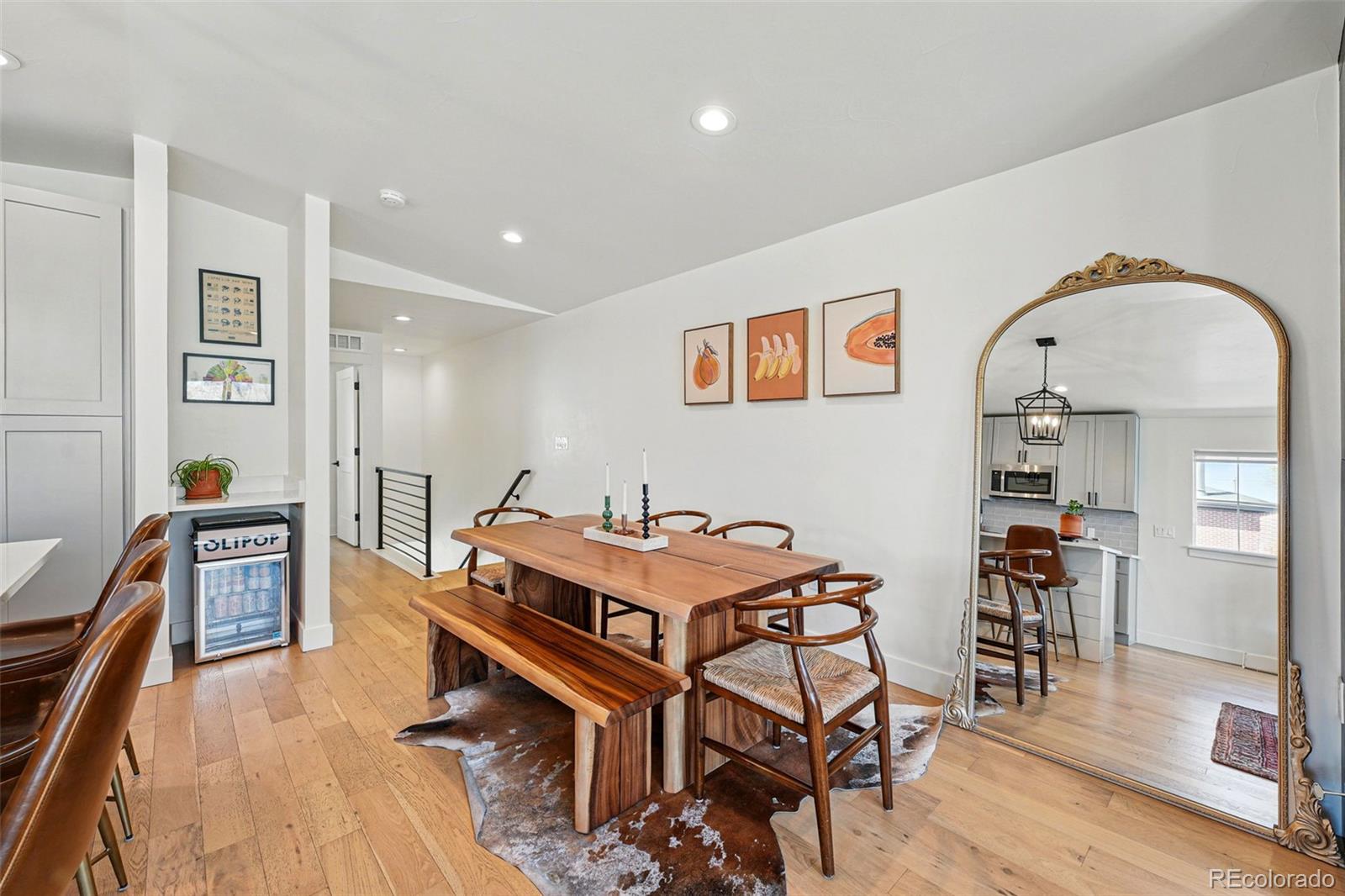 949 Raleigh Street, Unit 2 Denver, CO 80204 - Photo 13 of 42 a view of a livingroom with furniture and wooden floor