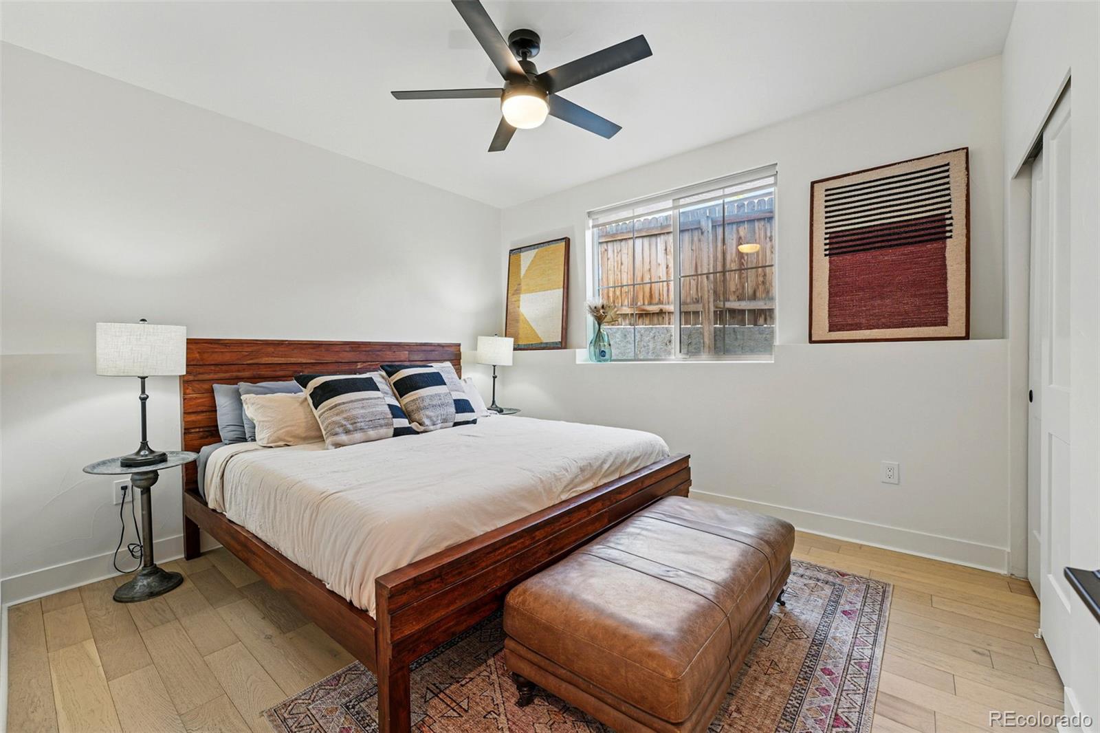 949 Raleigh Street, Unit 2 Denver, CO 80204 - Photo 25 of 42 a bedroom with a bed and window