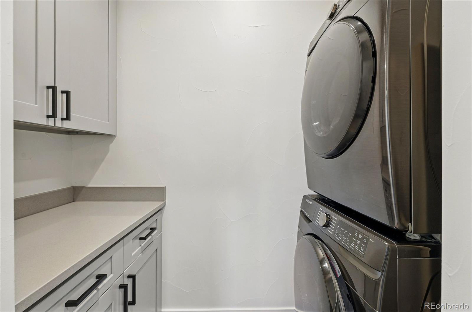 949 Raleigh Street, Unit 2 Denver, CO 80204 - Photo 30 of 42 view of a utility room with washer and dryer