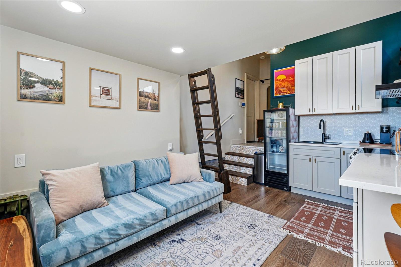 949 Raleigh Street, Unit 2 Denver, CO 80204 - Photo 32 of 42 a living room with furniture and kitchen view
