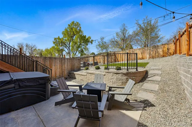 a view of balcony with wooden floor and outdoor seating