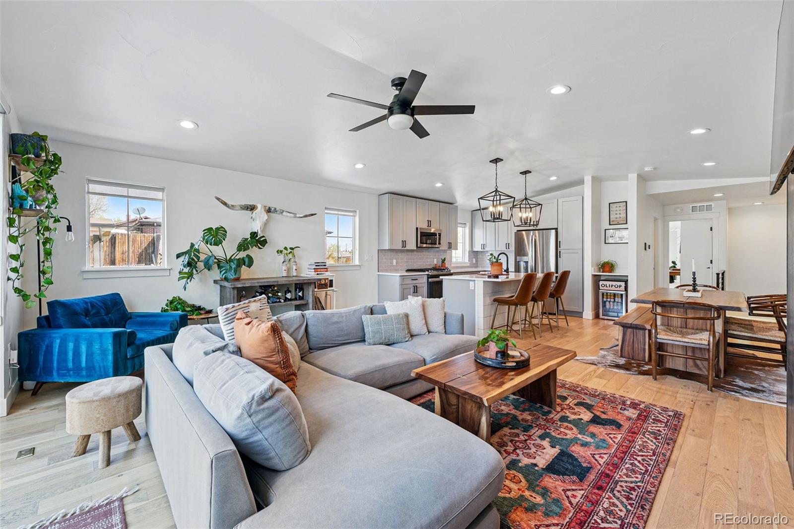 949 Raleigh Street, Unit 2 Denver, CO 80204 - Photo 7 of 42 a living room with furniture kitchen view and a window