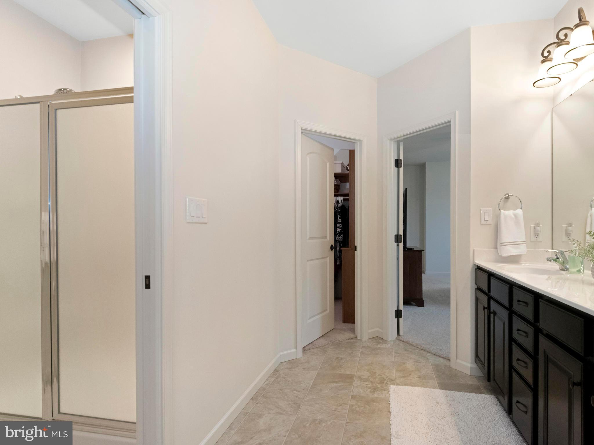 712 Bee Ridge Path Cochranville, PA 19330 - Photo 16 of 27 Master Bath with Walk In Closet and Shower