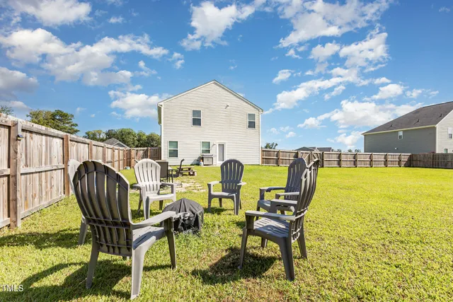 a bedroom with a bed and cabinets