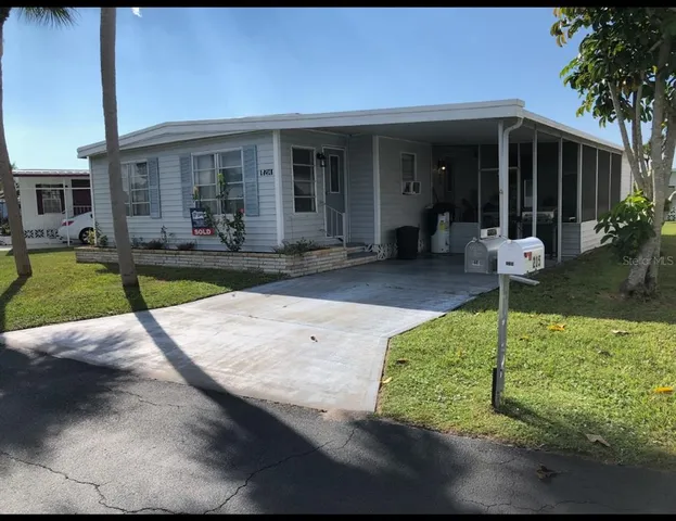 a house with garden in front of it