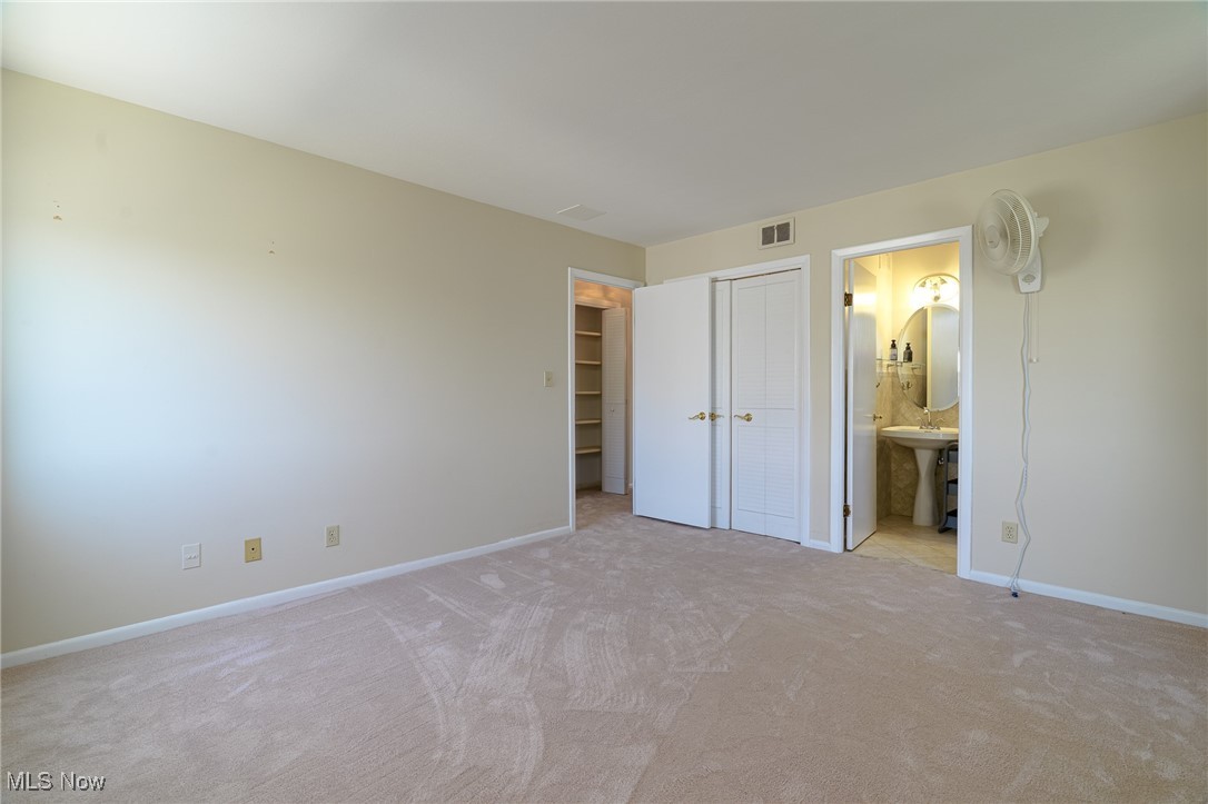 2089 Wooster Road, Unit C42 Rocky River, OH 44116 - Photo 15 of 43 Primary bedroom includes a walk-in closet and your own bathroom