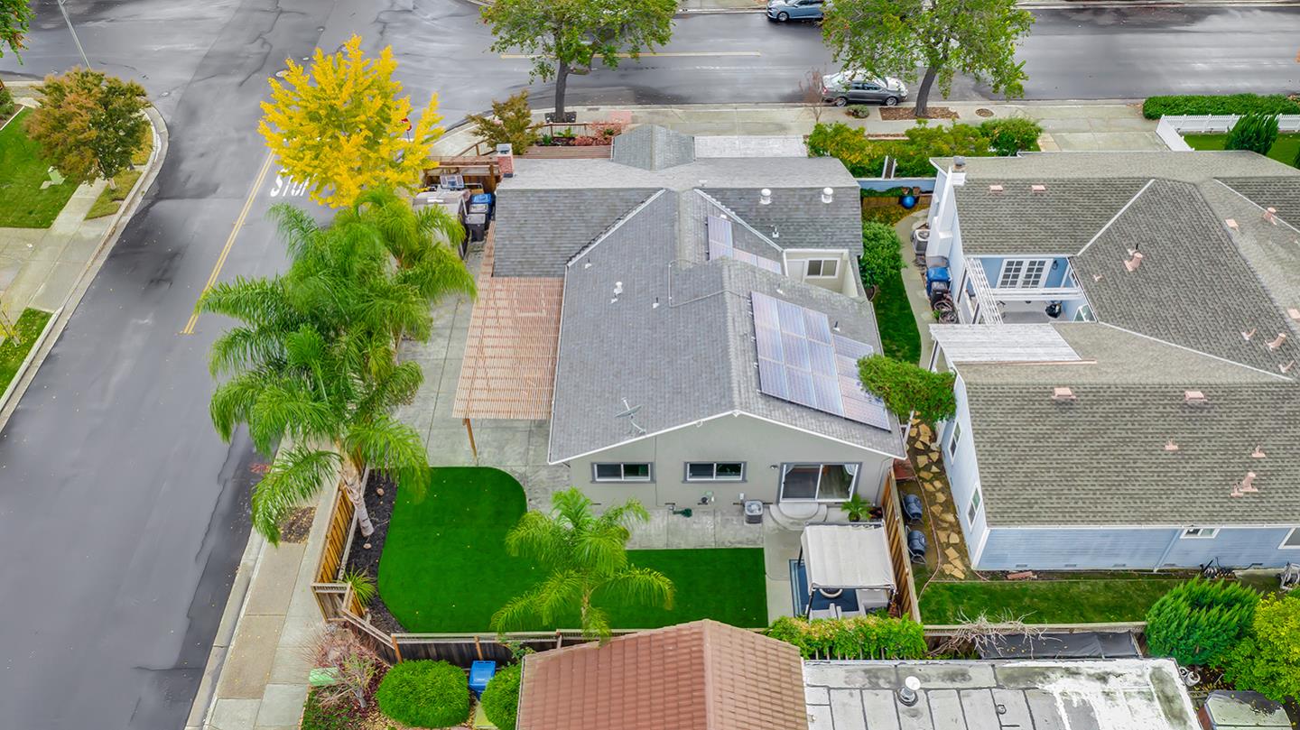 717 Charmain Drive Campbell, CA 95008 - Photo 20 of 23 aerial view of a house with a yard plants and large tree