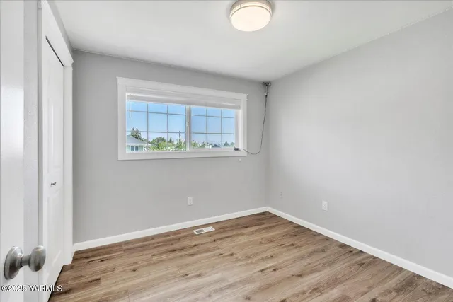 a view of a livingroom with a hallway