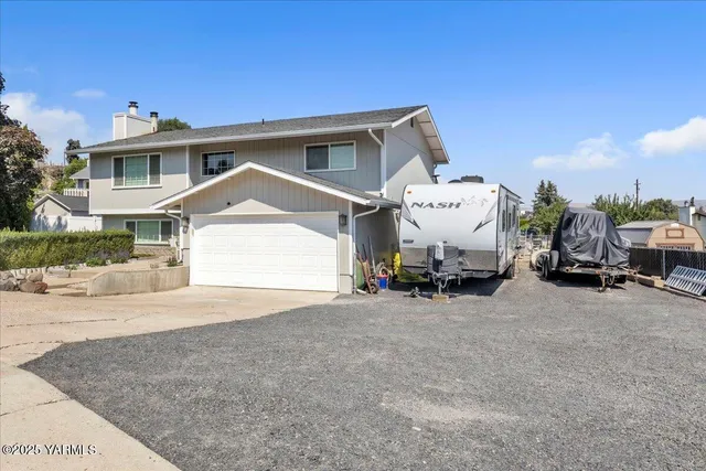 a view of a street with cars