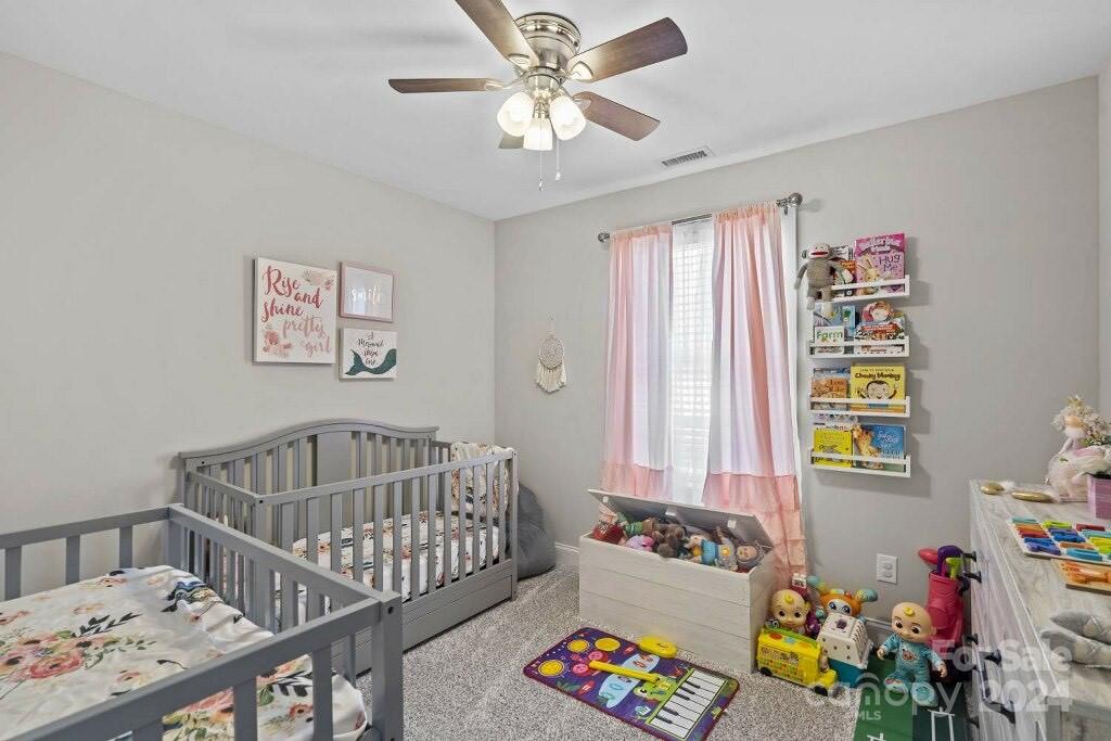 2522 Snow Creek Road Northeast Hickory, NC 28601 - Photo 21 of 24 a bedroom with furniture and a window