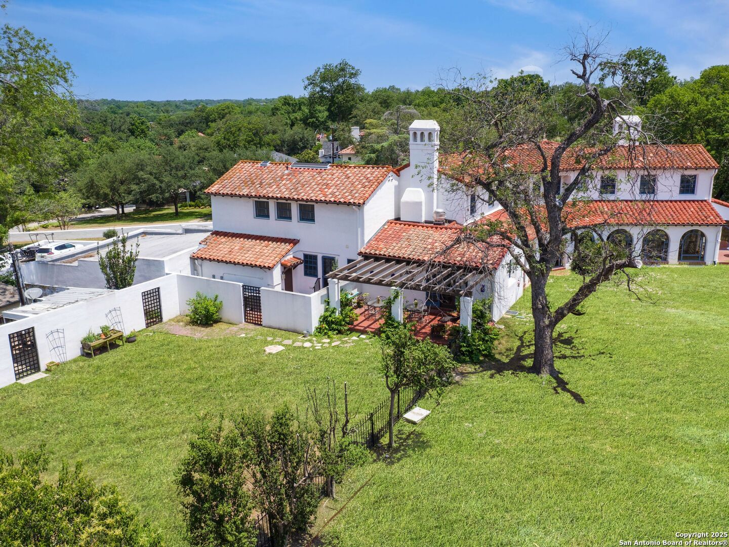 204 Zambrano Road San Antonio, TX 78209 - Photo 16 of 58 a aerial view of a house with a yard