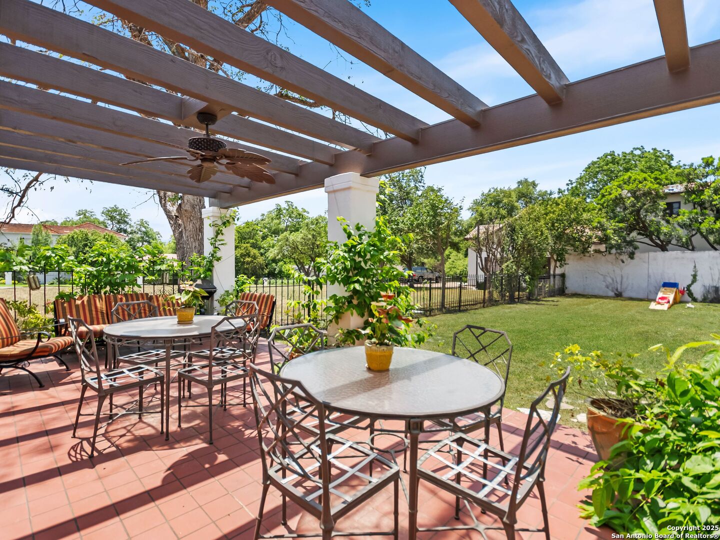 204 Zambrano Road San Antonio, TX 78209 - Photo 21 of 58 a view of a table and chairs in patio