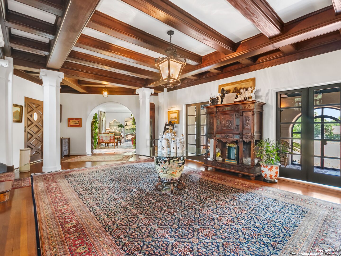 204 Zambrano Road San Antonio, TX 78209 - Photo 28 of 58 a living room with furniture and a floor to ceiling window
