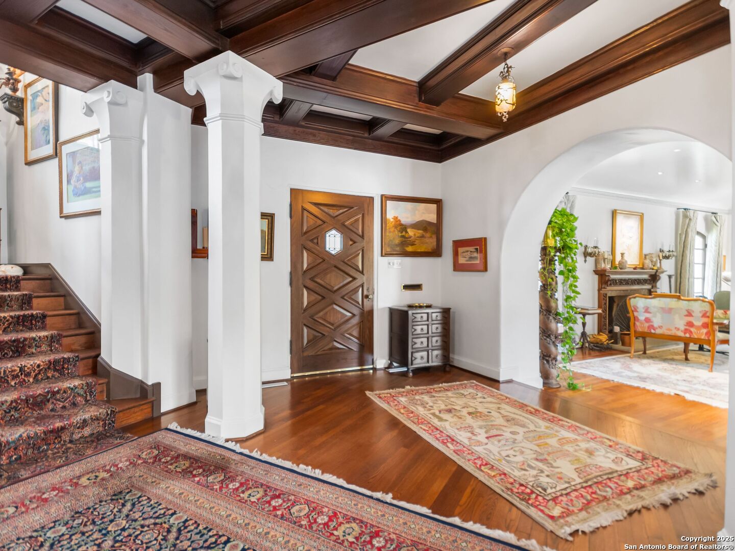 204 Zambrano Road San Antonio, TX 78209 - Photo 31 of 58 a view of a hallway with wooden floor and furniture