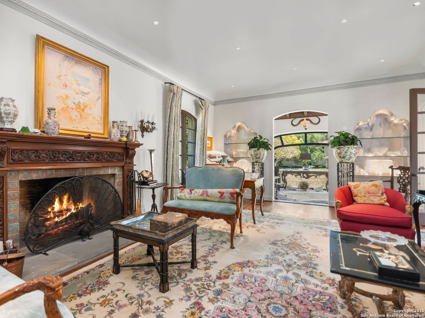204 Zambrano Road San Antonio, TX 78209 - Photo 33 of 58 a living room with furniture and a fireplace