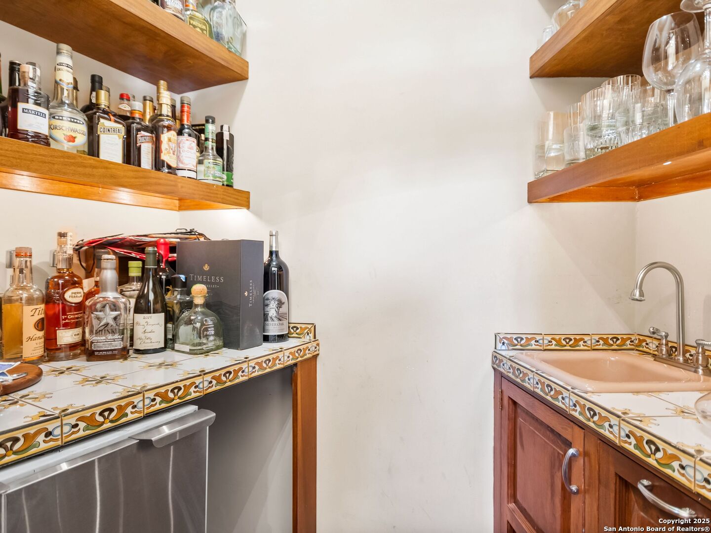 204 Zambrano Road San Antonio, TX 78209 - Photo 39 of 58 a bathroom with a sink and a mirror