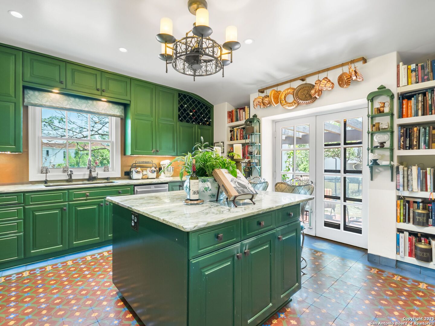 204 Zambrano Road San Antonio, TX 78209 - Photo 40 of 58 a kitchen with a sink appliances cabinets and a large window