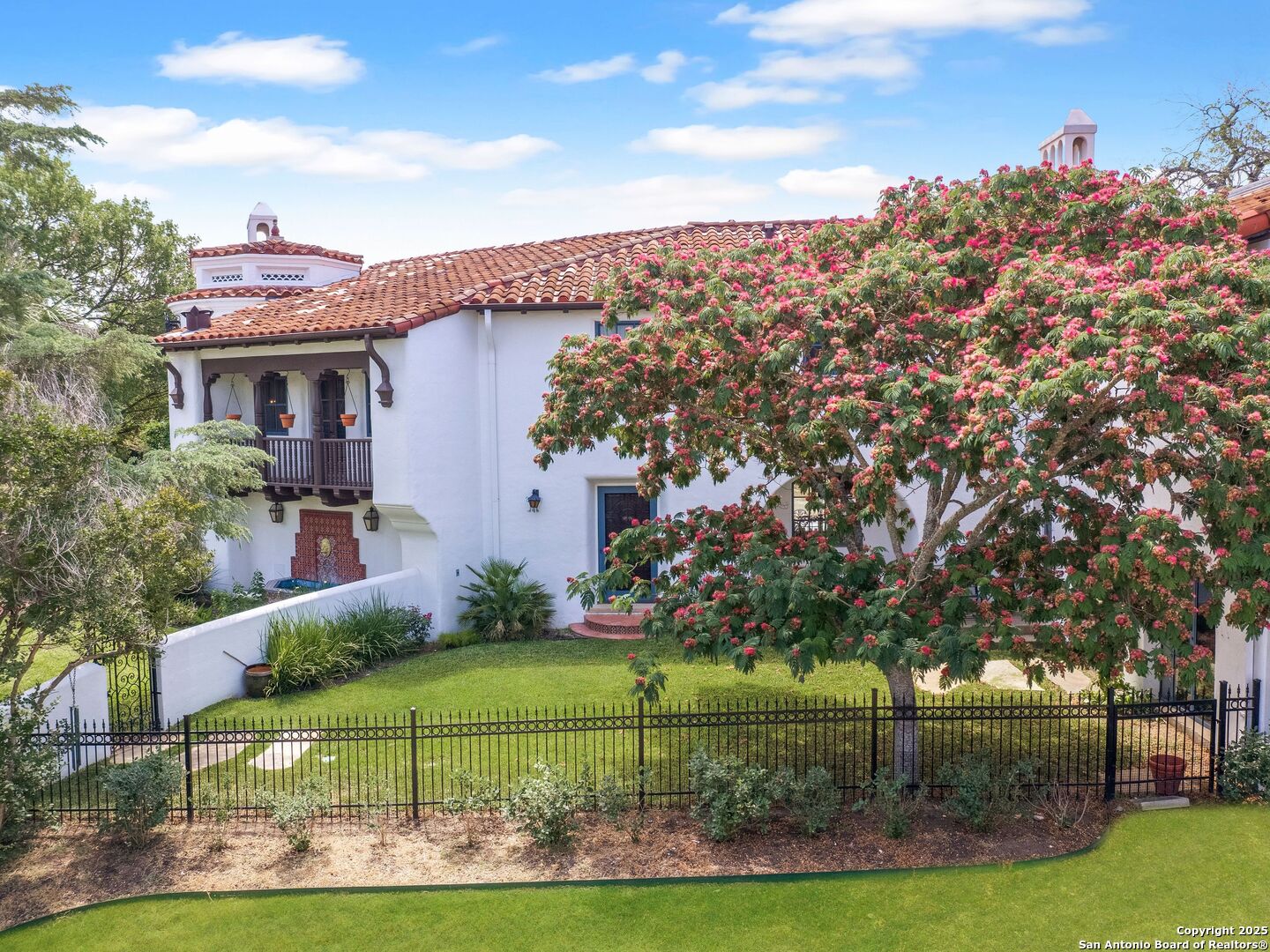 204 Zambrano Road San Antonio, TX 78209 - Photo 4 of 58 a front view of a house with garden
