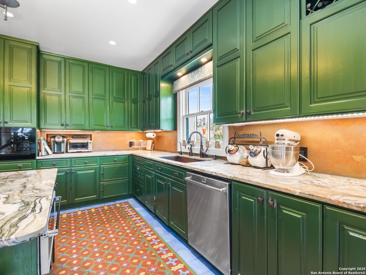 204 Zambrano Road San Antonio, TX 78209 - Photo 41 of 58 a kitchen with lots of counter space and a sink