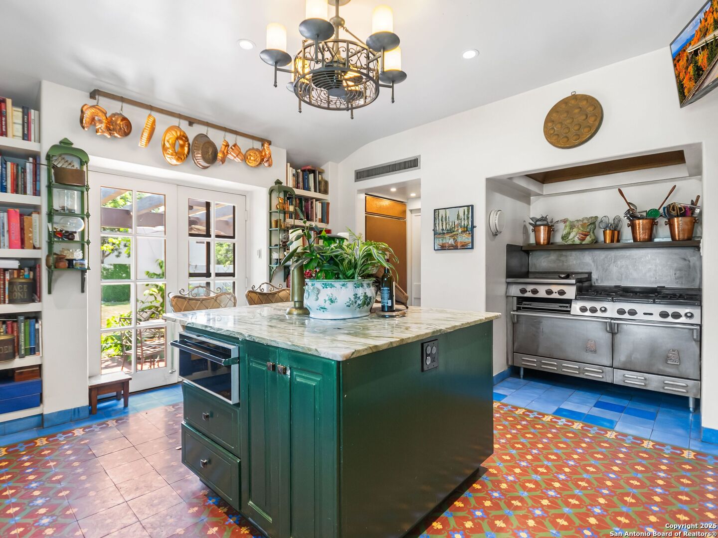 204 Zambrano Road San Antonio, TX 78209 - Photo 43 of 58 a kitchen with stainless steel appliances granite countertop a stove a sink and a refrigerator