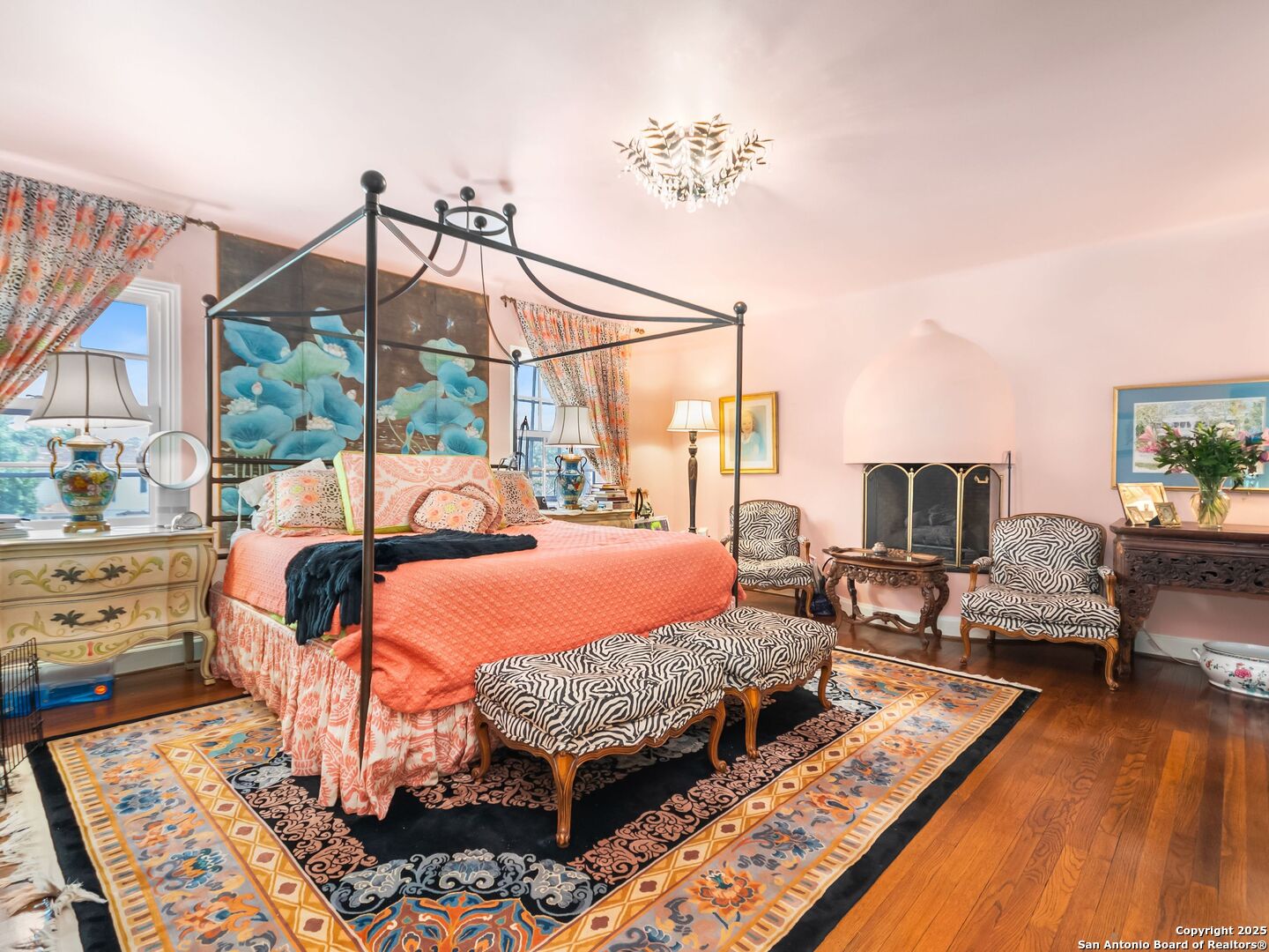 204 Zambrano Road San Antonio, TX 78209 - Photo 48 of 58 a bedroom with furniture and a wooden floor