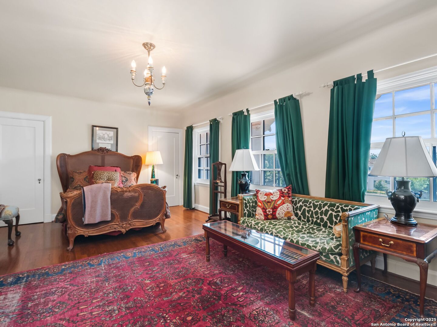 204 Zambrano Road San Antonio, TX 78209 - Photo 52 of 58 a living room with furniture and a chandelier