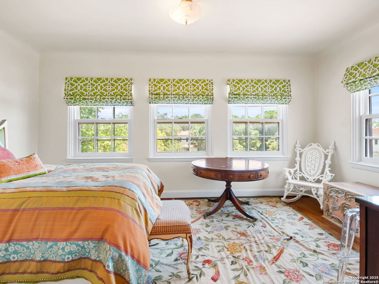 204 Zambrano Road San Antonio, TX 78209 - Photo 55 of 58 a bed sitting in a bedroom next to a window