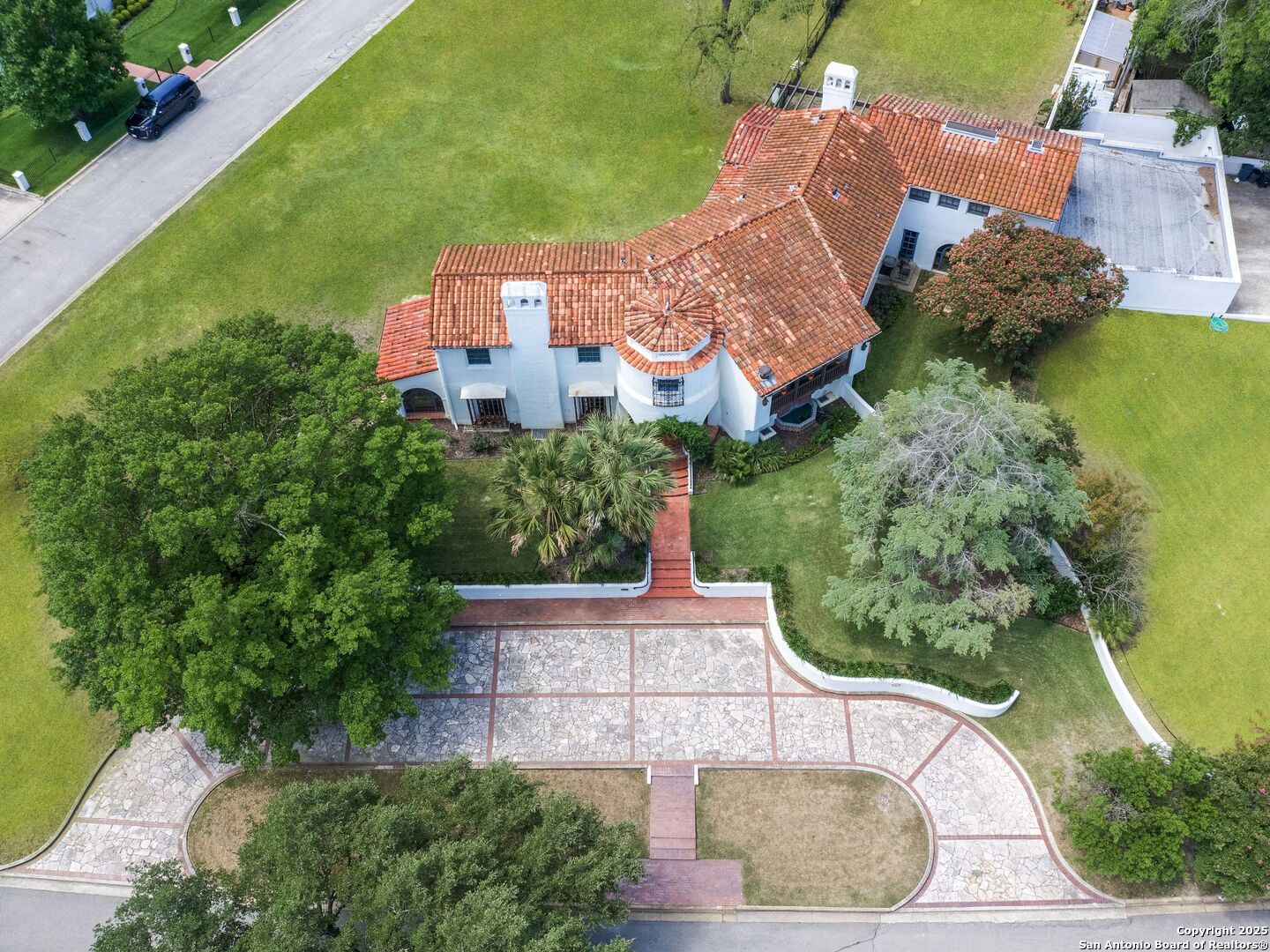 204 Zambrano Road San Antonio, TX 78209 - Photo 10 of 58 an aerial view of a house with garden space and street view