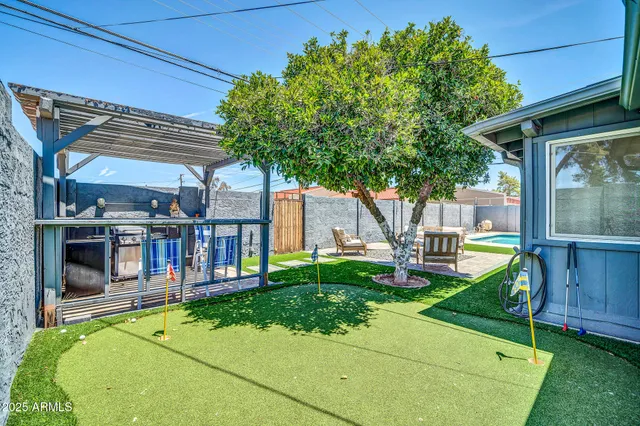 a house view with a sitting space and garden view
