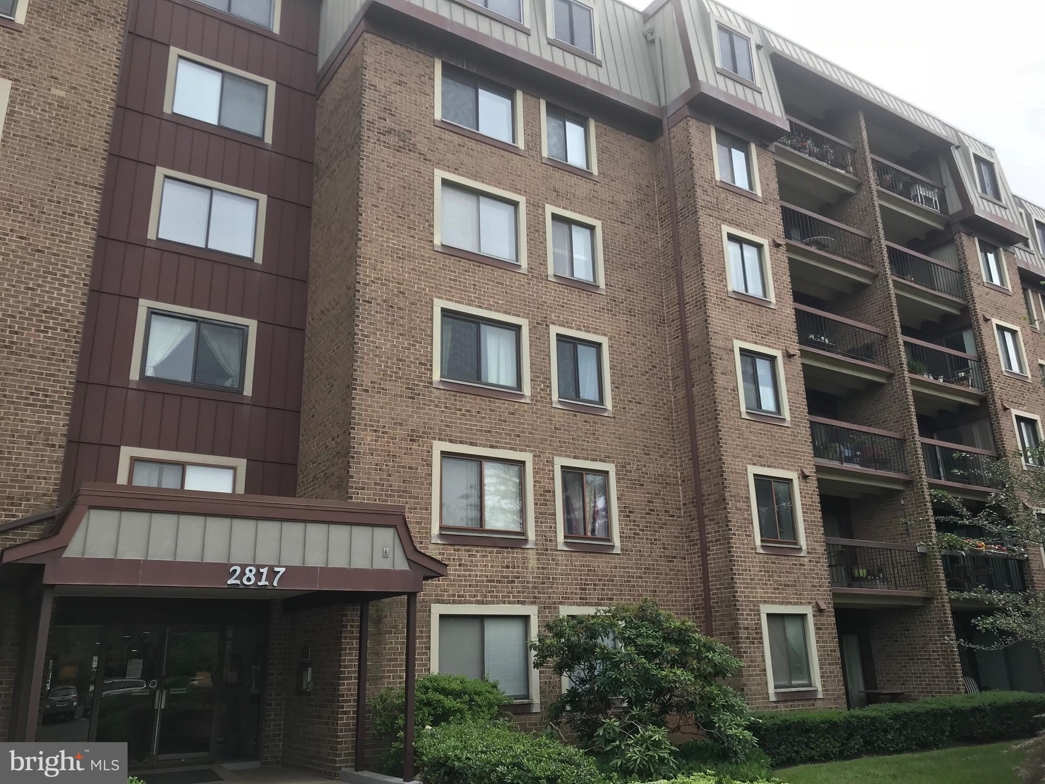 2817 Jermantown Road, Unit 203 Oakton, VA 22124 - Photo 1 of 22 a front view of a building