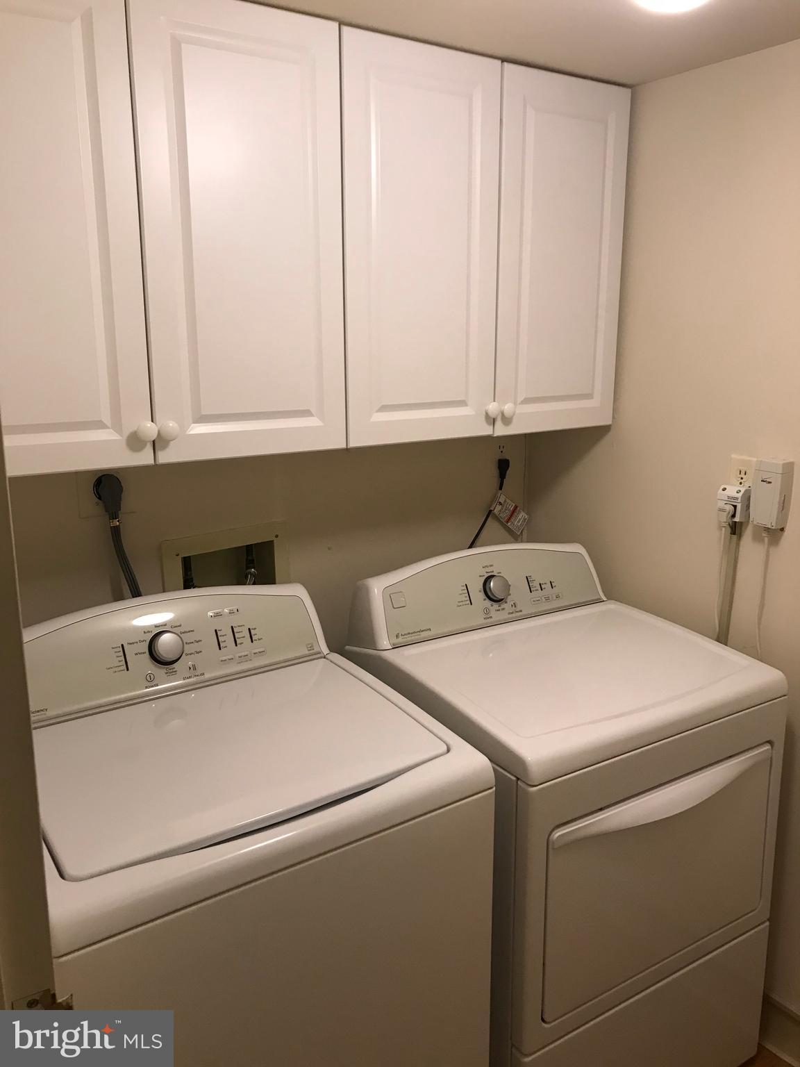 2817 Jermantown Road, Unit 203 Oakton, VA 22124 - Photo 21 of 22 a utility room with dryer and washer