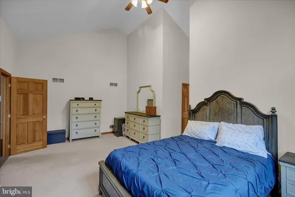 a view of a room with window and furniture