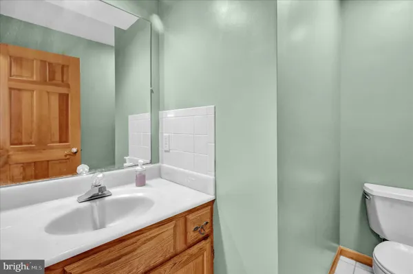 a large kitchen with stainless steel appliances lots of counter top space