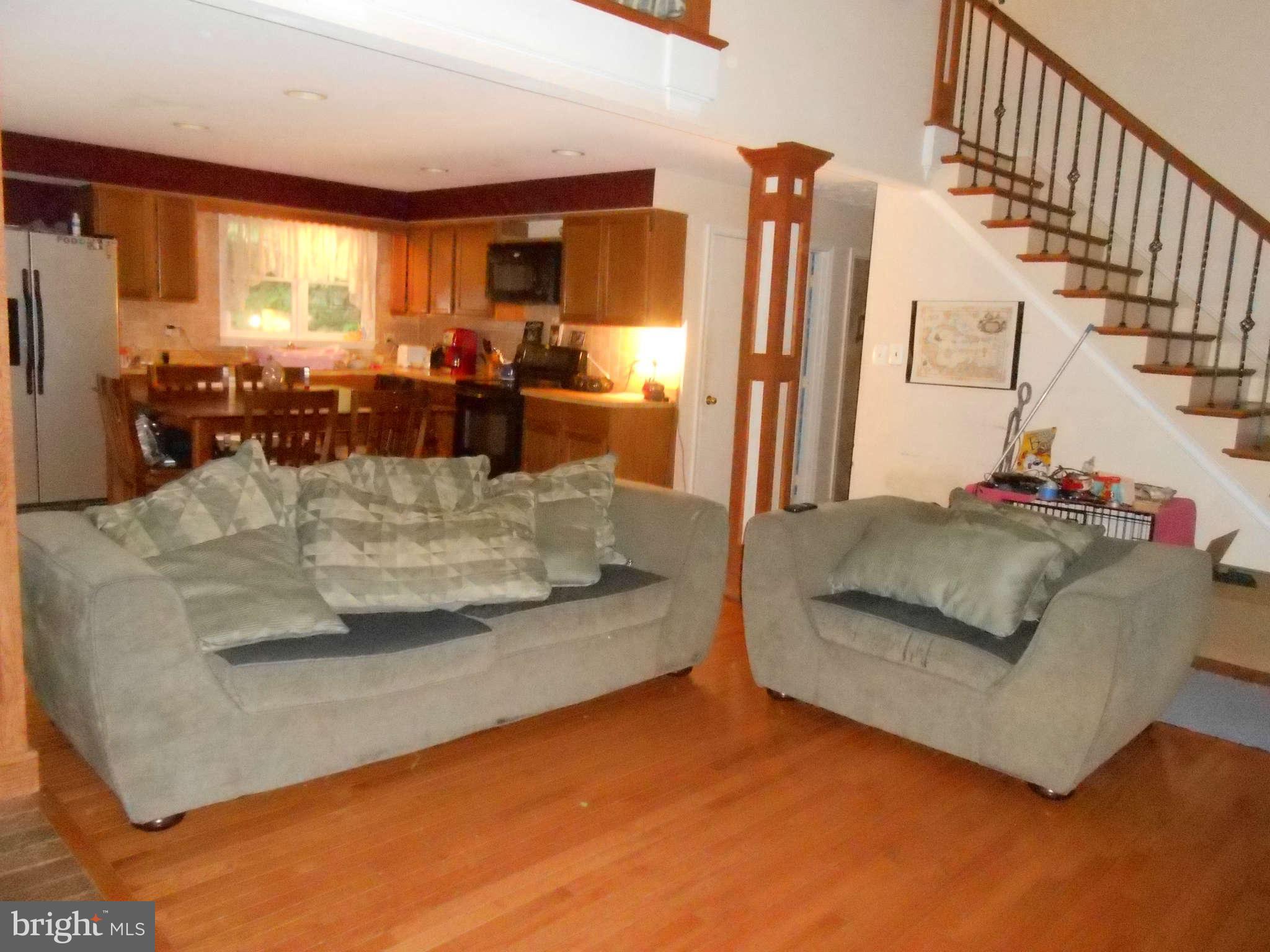 828 Jonathan Road Linden, VA 22642 - Photo 7 of 24 a living room with furniture and a table